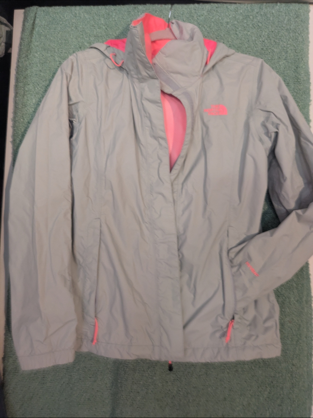The North Face Women's Light Gray Rain Jacket with Pink Accents